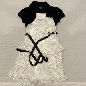 Girls Sequin Hearts dress size 14. Black and white dress with tie and flower